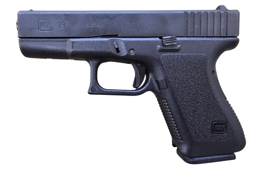 gebr. GLOCK Mod. 19 in Originalkassette mit Reservemagazin und Ladehilfe, Zustand: Gut